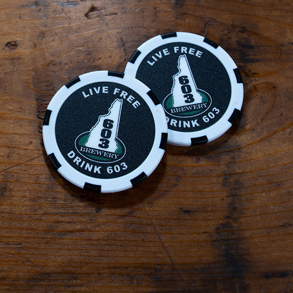 603 Brewery logo on black background on a white custom poker chip