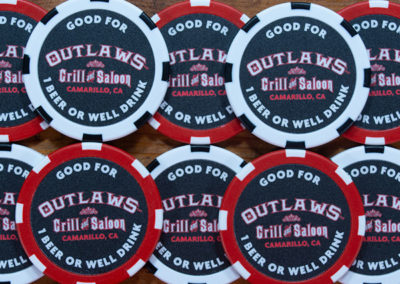 red and white Custom Drink chips for Outlaws Grill and Saloon